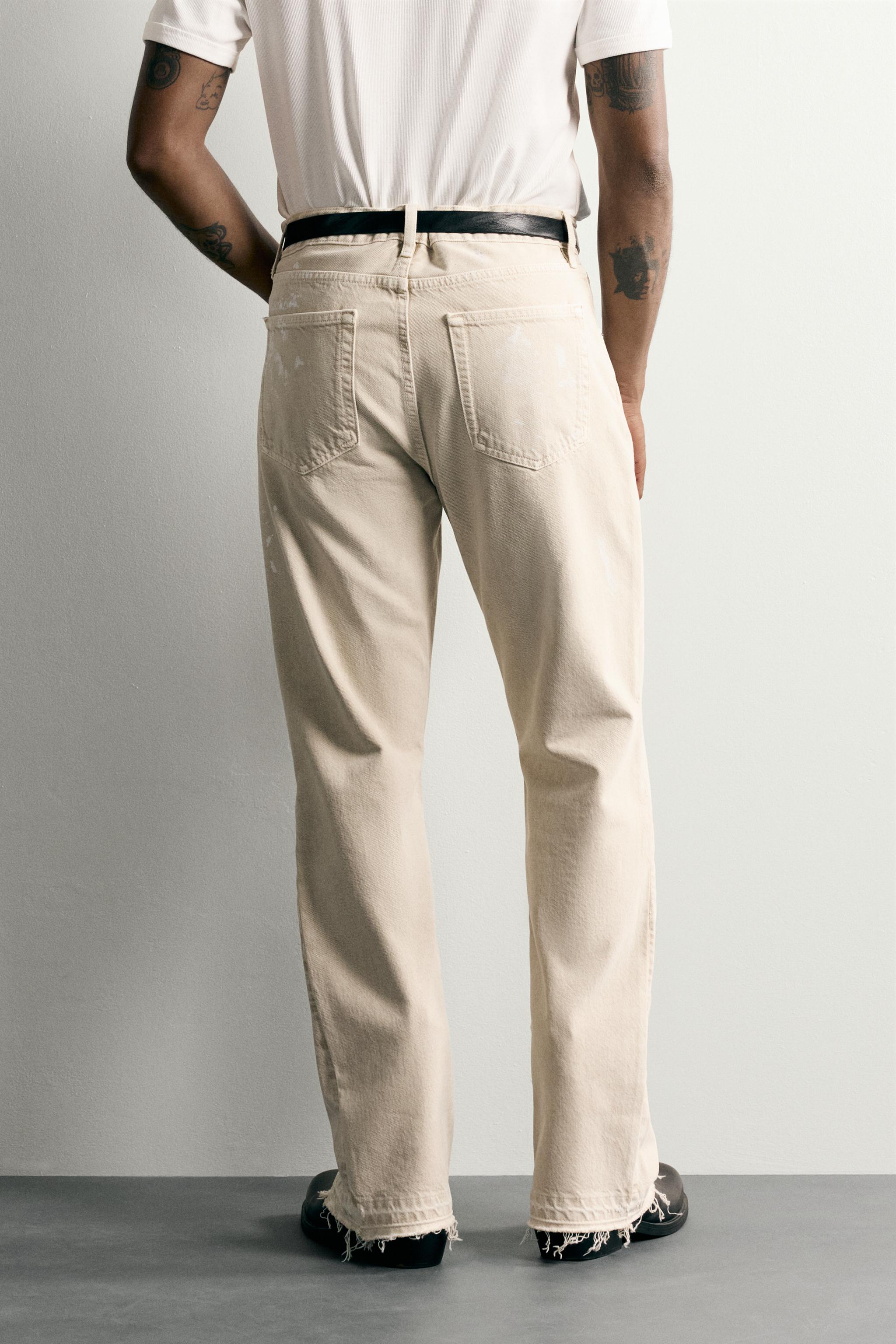 PAINT SPLATTER FLARE FIT JEANS